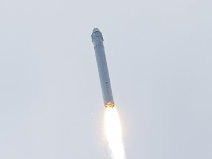 Delta IV rocket on launch pad, ready for 8:40 p.m. liftoff